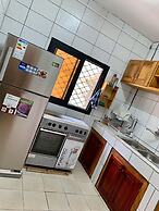 The White House Home in the Heart of Bonamoussadi