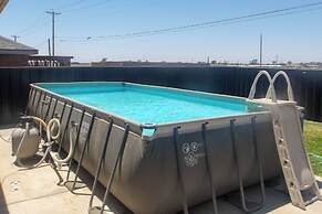 Pool + Fire Pit: Family Home in Odessa