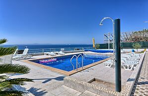 Seaside Apartment with Pool