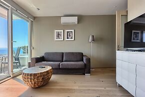 Seaside Apartment with Pool