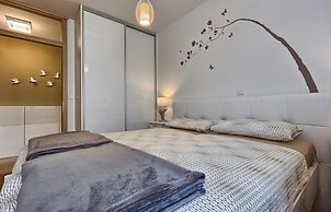 Seaside Apartment with Pool