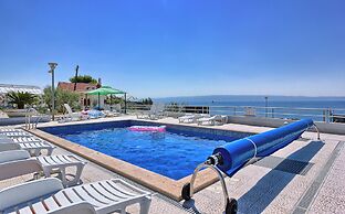 Seaside Apartment with Pool