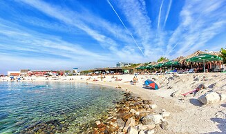 Seaside Apartment with Pool