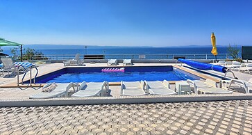 Seaside Apartment with Pool