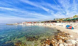 Seaside Apartment with Pool