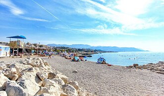 Seaside Apartment with Pool