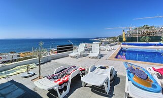 Seaside Apartment with Pool