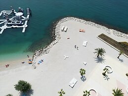 Seaside Apartment with Pool