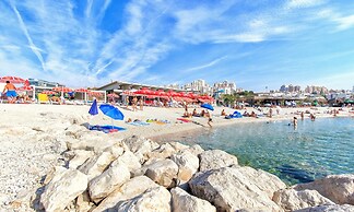 Seaside Apartment with Pool