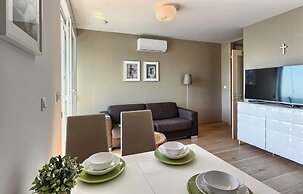 Seaside Apartment with Pool