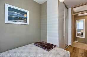 Seaside Apartment with Pool