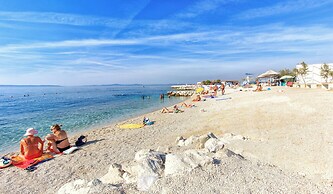 Seaside Apartment with Pool