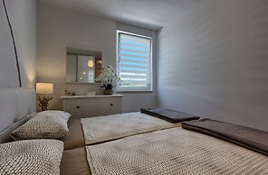 Seaside Apartment with Pool