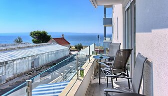Seaside Apartment with Pool