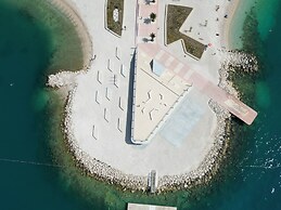 Seaside Apartment with Pool