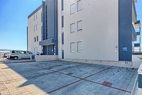 Seaside Apartment with Pool