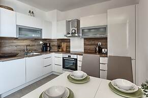 Seaside Apartment with Pool