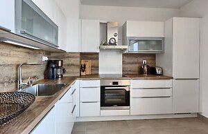 Seaside Apartment with Pool