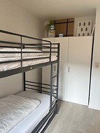 Huswell - Beachfront Apartment With Bike Storage
