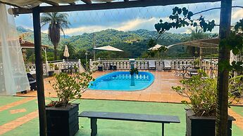 Pousada Encantos da Serra Macacos