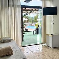 Pousada Encantos da Serra Macacos