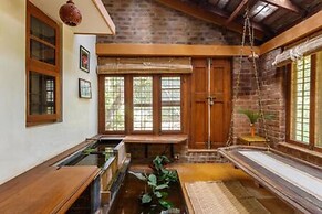 Kerala Style Villa by Stayjade | AC | 4bhk | fishpond