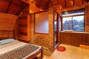 Kerala Style Villa by Stayjade | AC | 4bhk | fishpond