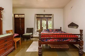 Kerala Style Villa by Stayjade | AC | 4bhk | fishpond