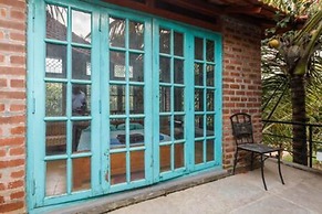 Kerala Style Villa by Stayjade | AC | 4bhk | fishpond