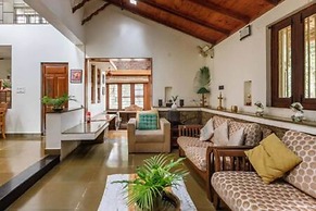 Kerala Style Villa by Stayjade | AC | 4bhk | fishpond