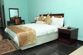 Kaura Hotel and Suites