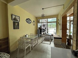 Singh Saab Rooms & Cafe