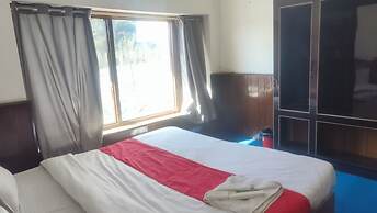 Singh Saab Rooms & Cafe
