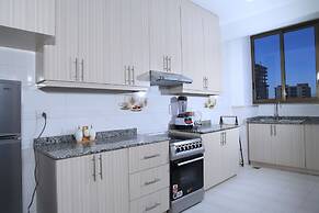 PrimeNest - 3 bedroom Apartment