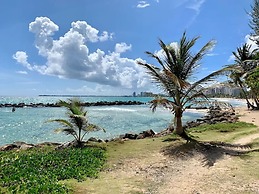 Beach Access Escape With Pool and Tanning Lounges