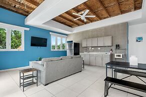 Beach Access Escape With Pool and Tanning Lounges
