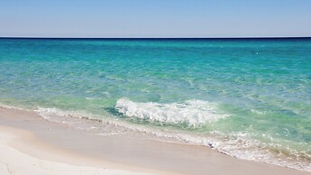 Serenity by the Sea! 4BR Retreat, Sleeps 12, Walk to Beach & Community