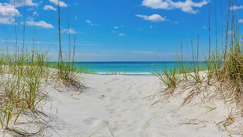 Serenity by the Sea! 4BR Retreat, Sleeps 12, Walk to Beach & Community