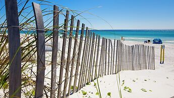 Serenity by the Sea! 4BR Retreat, Sleeps 12, Walk to Beach & Community