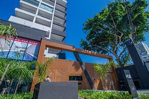 Studio Elegante com Varanda e Tima Localiza o