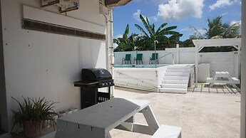 Poolside Seaview Studio w Pool & Deck Near Airport