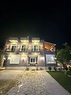 Maison Apartments