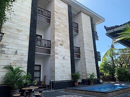 Capital O 94586 New Asta Graha Homestay