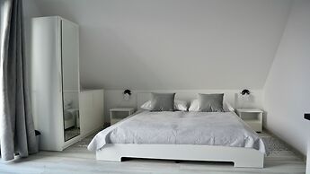 Apartamenty Sun & Snow Zasypane Mazury