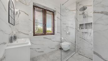 Apartamenty Sun & Snow Zasypane Mazury