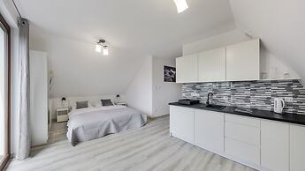 Apartamenty Sun & Snow Zasypane Mazury