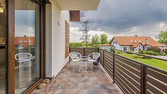 Apartamenty Sun & Snow Zasypane Mazury