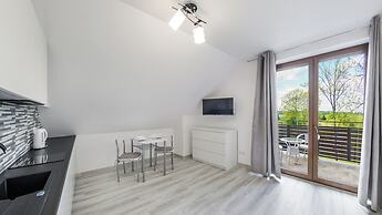Apartamenty Sun & Snow Zasypane Mazury