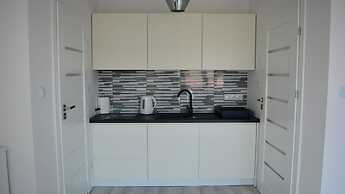 Apartamenty Sun & Snow Zasypane Mazury