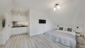 Apartamenty Sun & Snow Zasypane Mazury